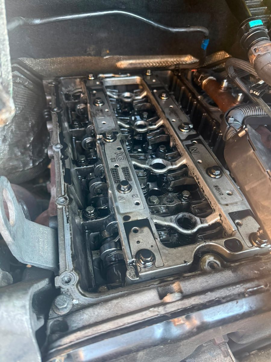 Engine cylinder head exposed during a repair